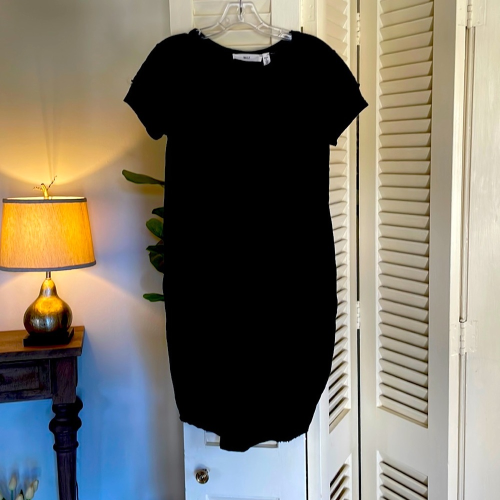 Wilt short sleeve with flutter details. Short high low and cozy dress
